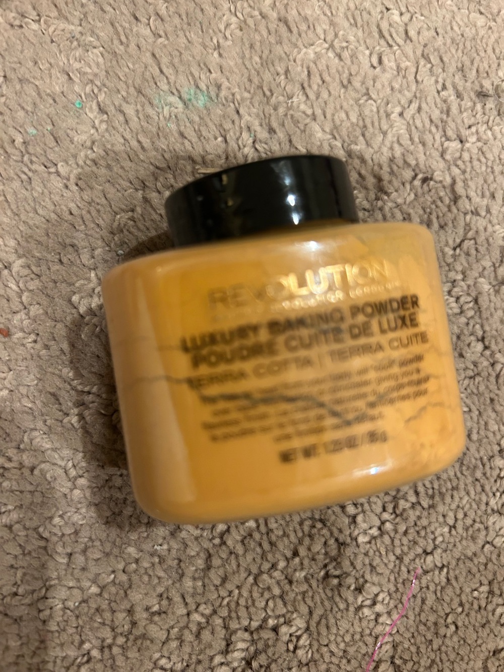 Revolution Luxury Baking Powder - Yellow Jar with Black Cap loose